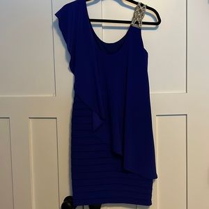 Knee length royal blue dress. Texture, draping and bling. It has it all!